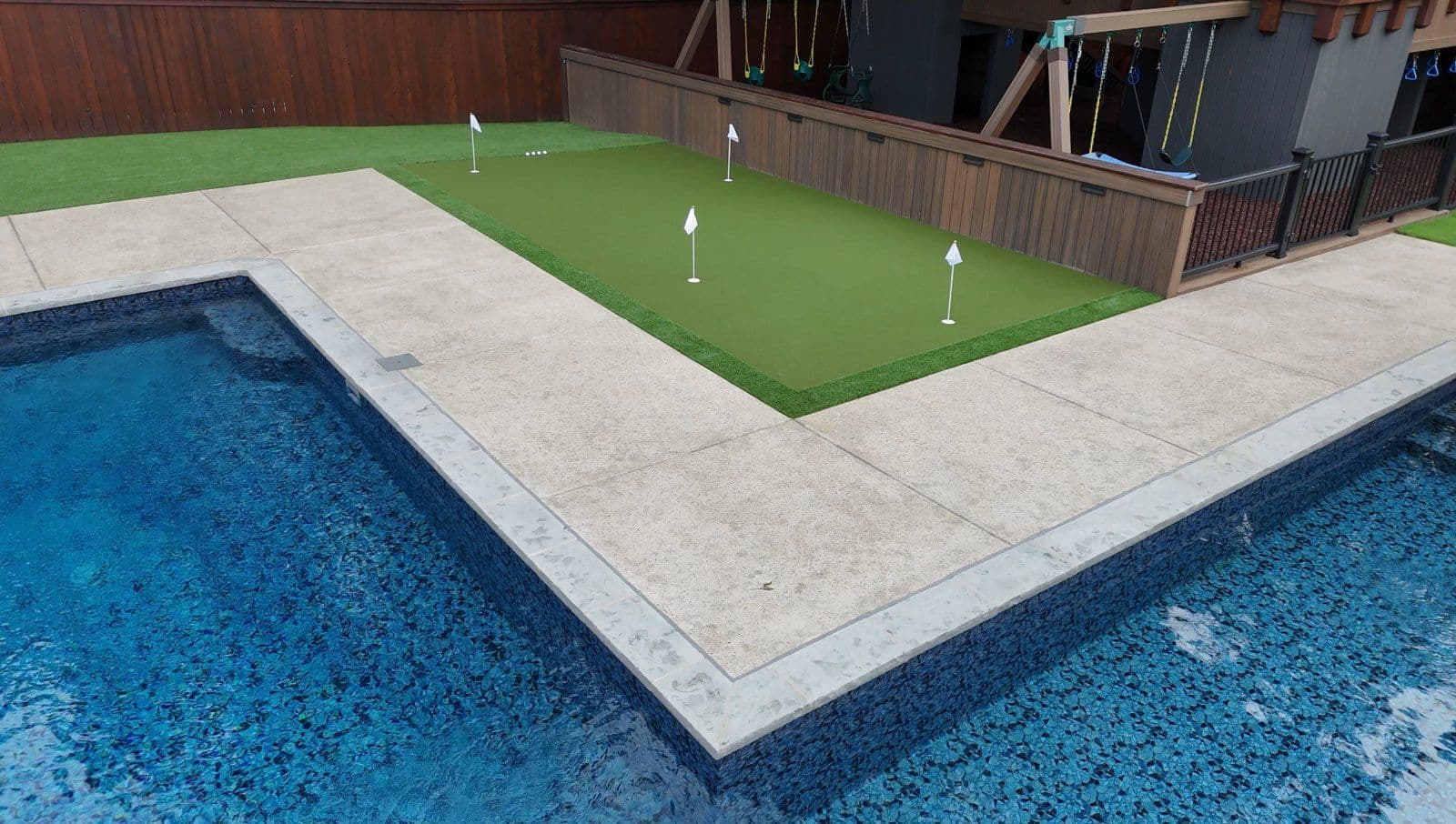 Gallery photos for Enhance Your Backyard with a Poolside Putting Green: Image #1