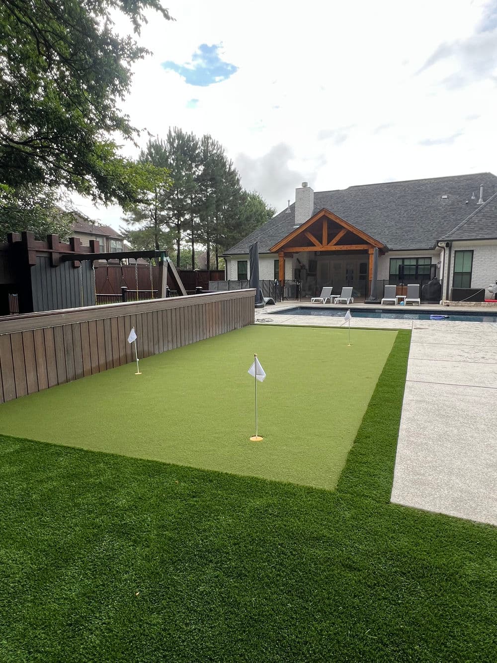 Gallery photos for Enhance Your Backyard with a Poolside Putting Green: Image #4